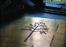 The hand-cut die used to emboss the diary's tree mark