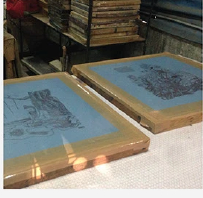 Illustration boards printed and drying before the run