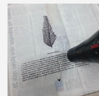 A finished bird illustration hand-printed on the fabric